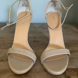 Express patent leather ankle strap high heel sandals.